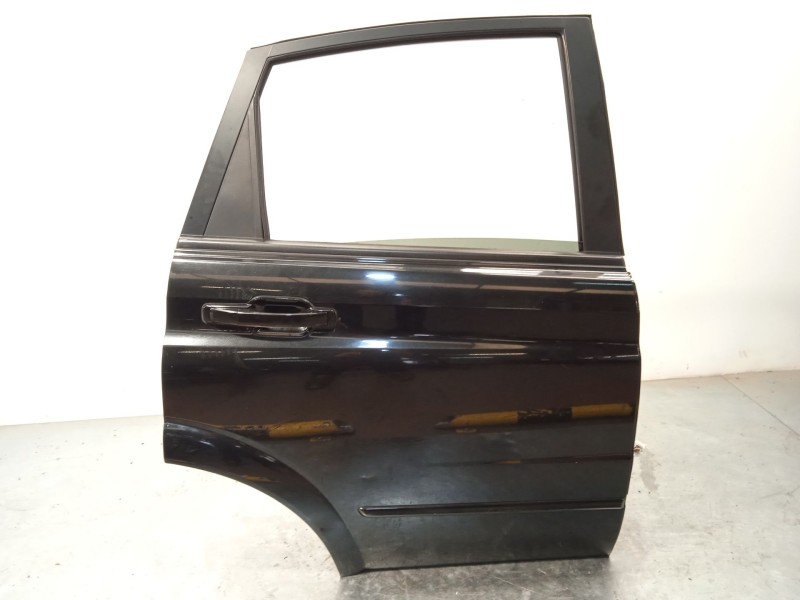 Recambio de puerta trasera derecha para ssangyong actyon i 2.0 xdi referencia OEM IAM 6302131000  