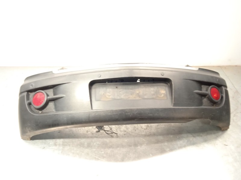 Recambio de paragolpes trasero para ssangyong actyon i 2.0 xdi referencia OEM IAM 7881031213ABT  