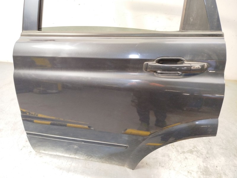 Recambio de puerta trasera izquierda para ssangyong actyon i 2.0 xdi referencia OEM IAM 6301131000  