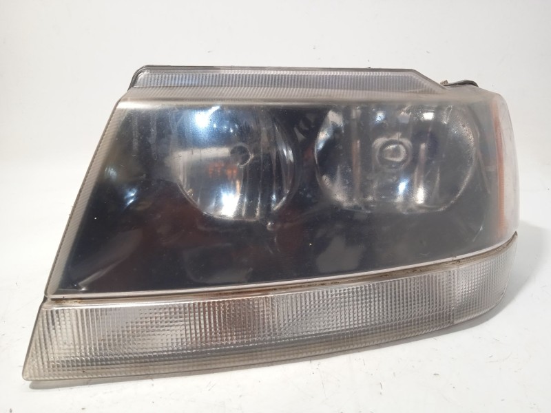 Recambio de faro izquierdo para jeep gr.cherokee (wj/wg) 3.1 td cat referencia OEM IAM 55155145 K55155145 