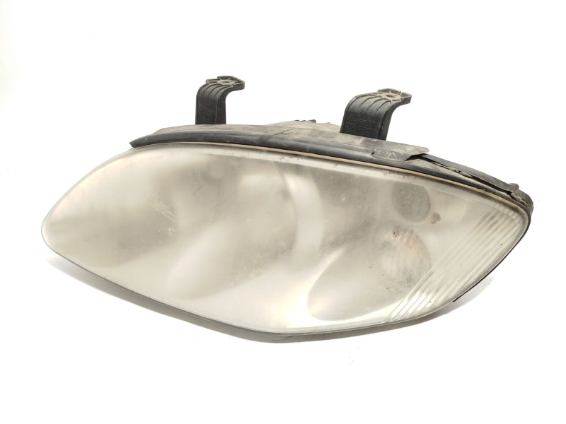Recambio de faro izquierdo para ssangyong rodius i 2.7 xdi referencia OEM IAM 8310121201  