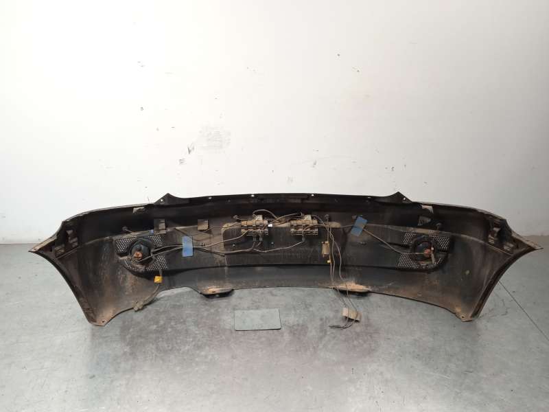 Recambio de paragolpes trasero para ssangyong actyon i 2.0 xdi referencia OEM IAM 7881031213ABT 7