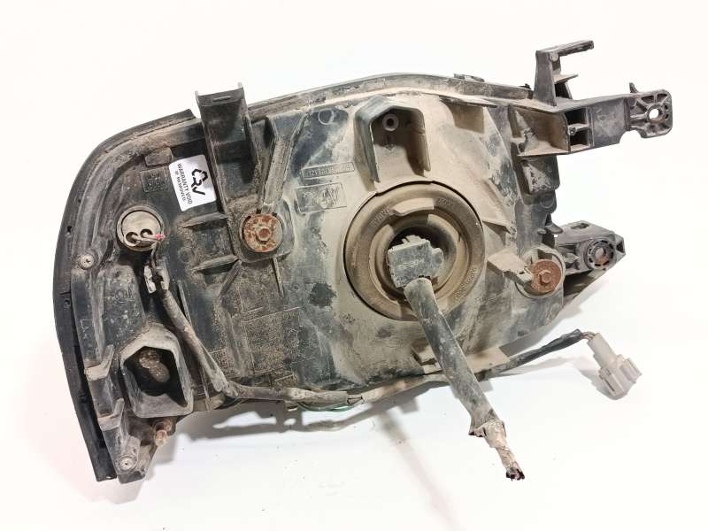Recambio de faro izquierdo para nissan pick up (d22) 2.5 dci 4wd referencia OEM IAM 26060VK425 4